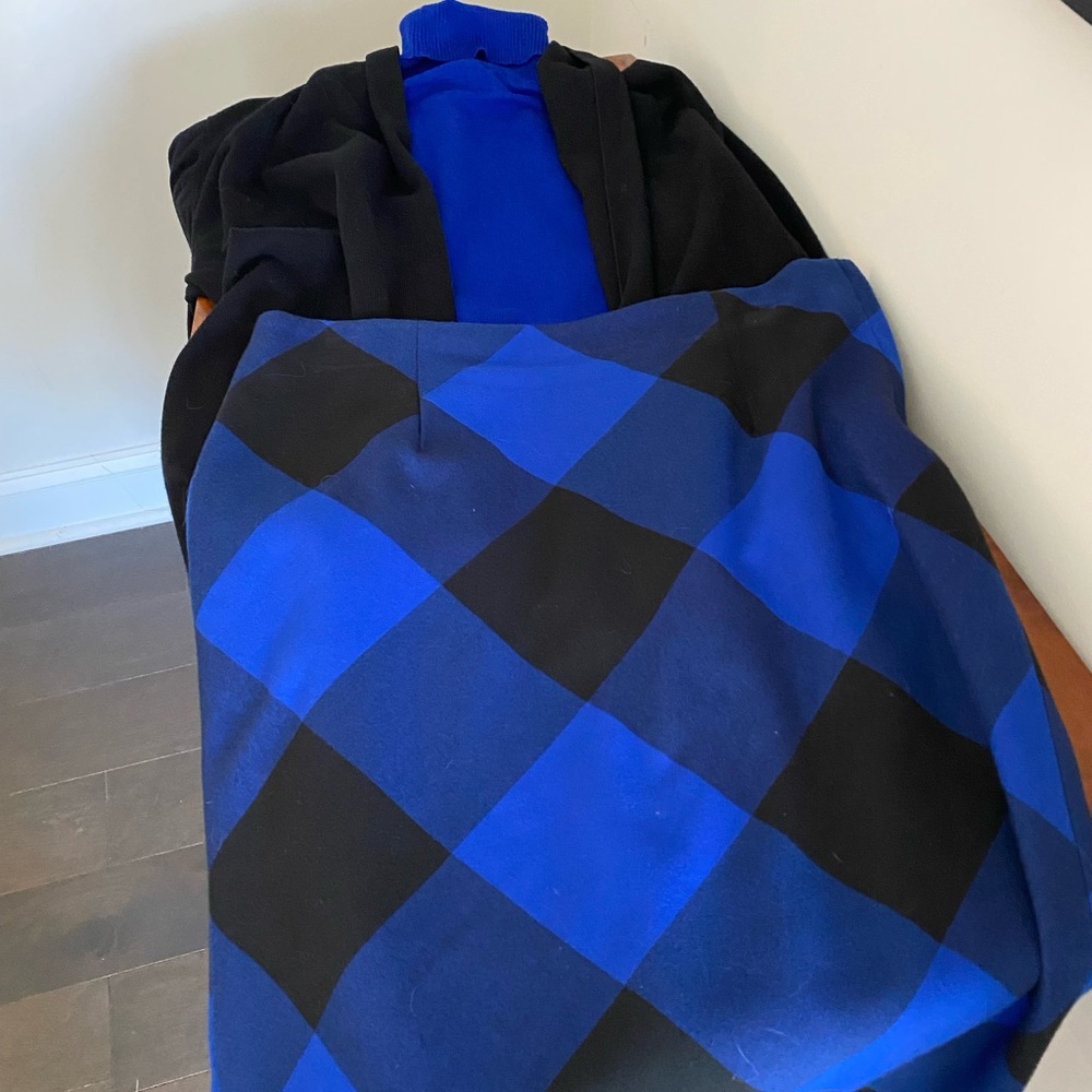 Blue sleeveless seater.